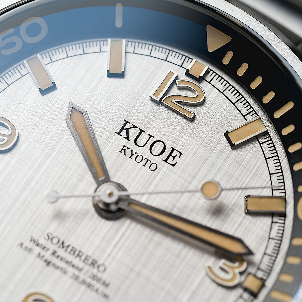 Kuoe Sombrero 90-011, Silver, Linen Textured Dial, 20 Bar Water Resistant